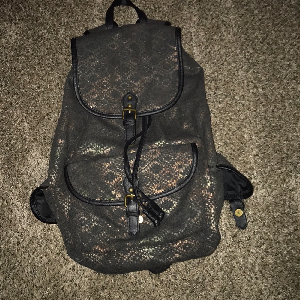 Metallic Aztec design book bag